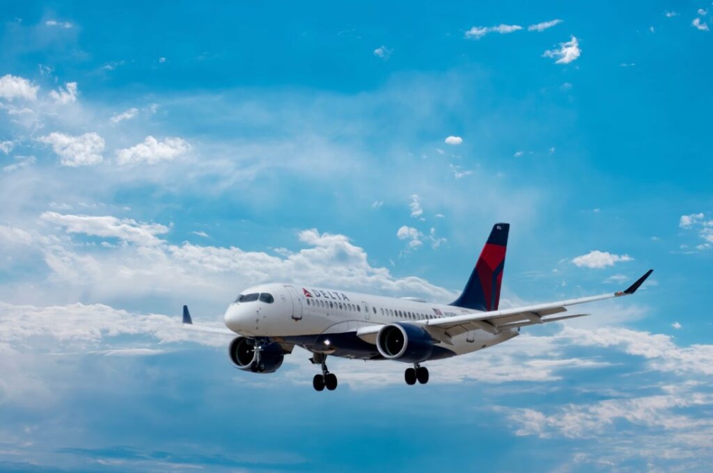 Unsplash Photo Delta Airlines Passenger Plane Under Blue Sky During Daytime PdrwcUP BRA Web